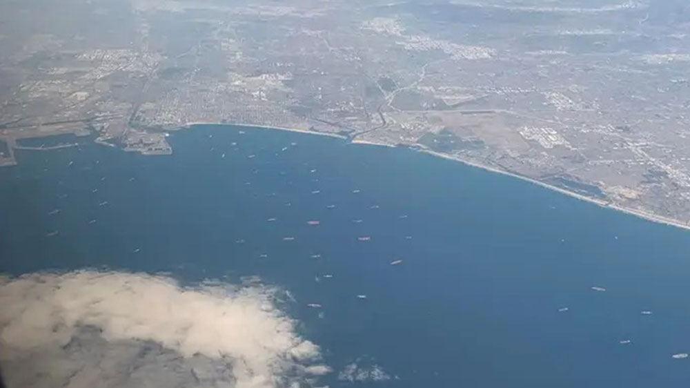 Take a Look at the Record-breaking Port Congestion From 10,000 Feet Above, As 70 Hulking Cargo Ships Park Off the LA Coast