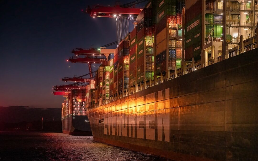 Evergreen container ship side view at night time