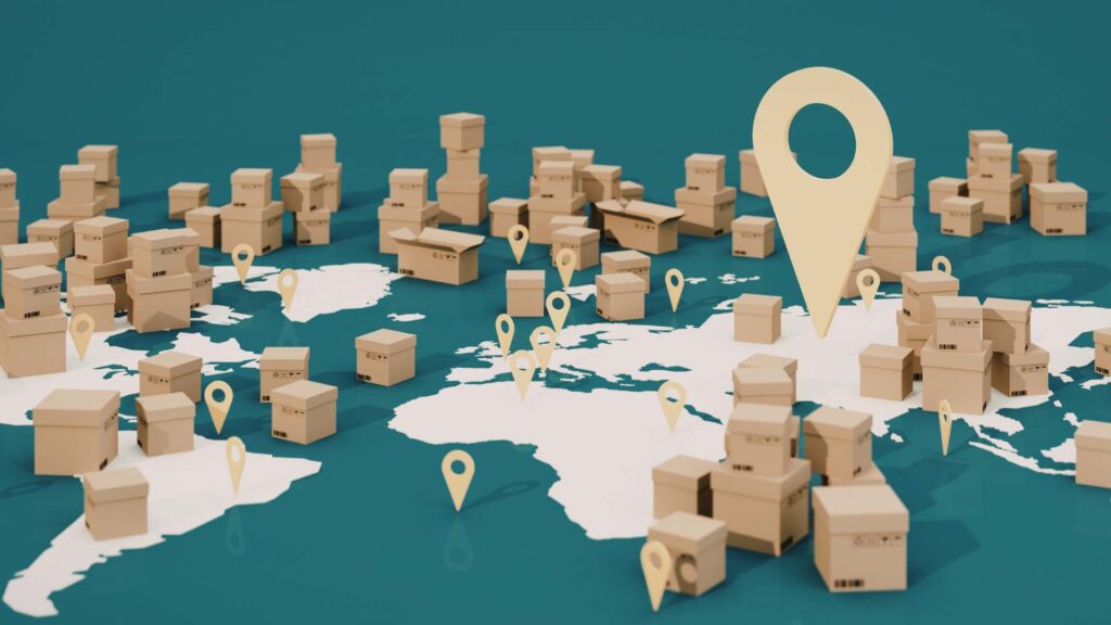 World map illustration with shipping boxes and location markers placed across multiple continents, representing global trade, imports, and supply chain networks.