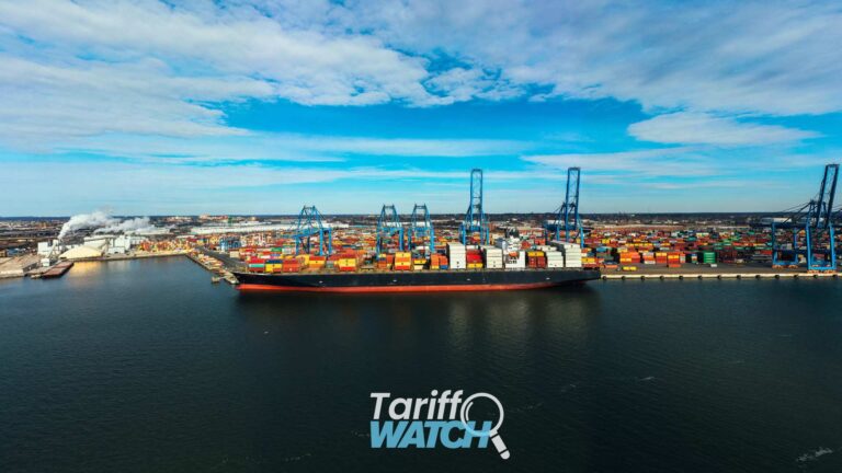 Container ship at a commercial cargo port representing the expiration of Section 122 tariffs, new Section 301 forced labor tariffs, Section 338 tariffs on Canada, customs enforcement, international trade, and global supply chain developments featured in Tariff Watch.